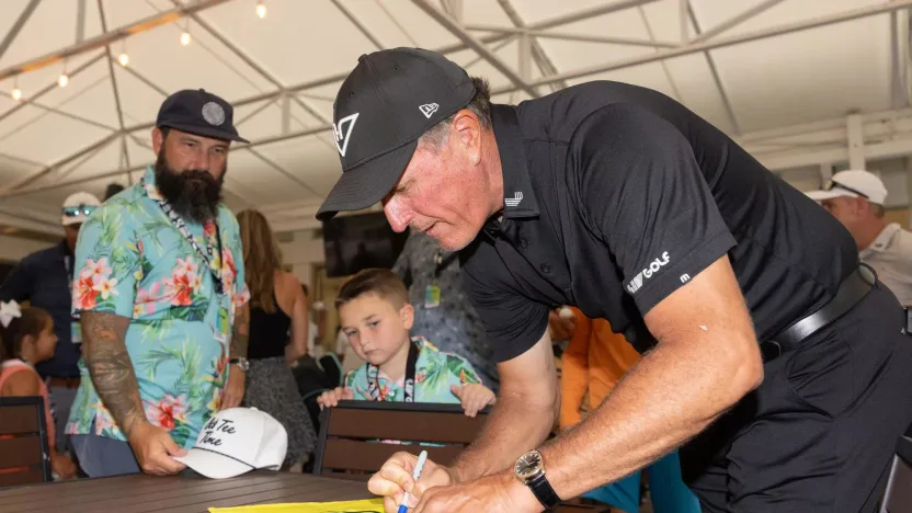 Captain Phil Mickelson of HyFlyers GC signs autographs for fans during the Bunkers in Baghdad Clinic during the practice round before the start of LIV Golf Houston at Golf Club of Houston on Wednesday, June 05, 2024 in Humble, Texas. (Photo by Chris Trotman/LIV Golf)