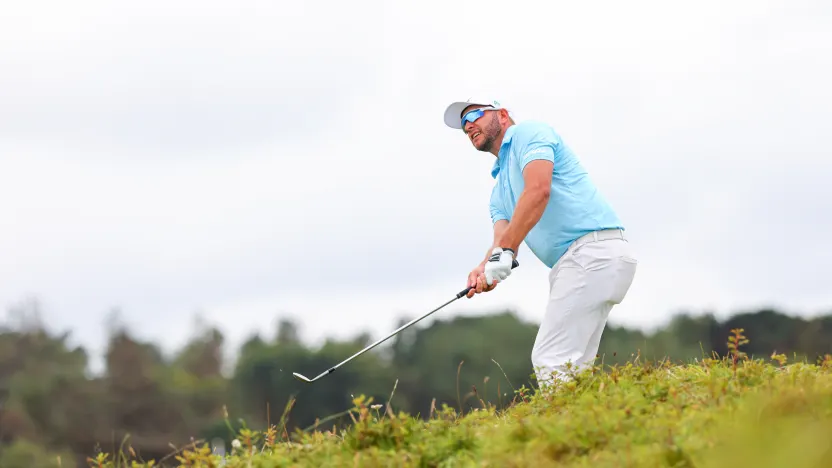 Dean Burmester of Stinger GC hits his shot on the fifth hole during the third round of The Open Championship at Royal Portrush Golf Club on Saturday, July 19, 2025 in Portrush, Northern Ireland. (Photo by Chris Trotman/LIV Golf)