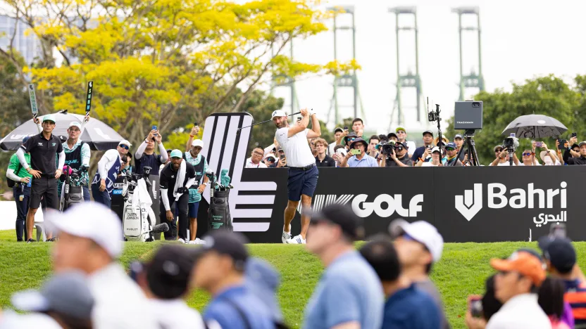Captain Dustin Johnson of 4Aces GC hits his shot from the ninth tee during the final round of LIV Golf Singapore at Sentosa Golf Club on Sunday, March 16, 2025 in Sentosa, Singapore. (Photo by Chris Trotman/LIV Golf)