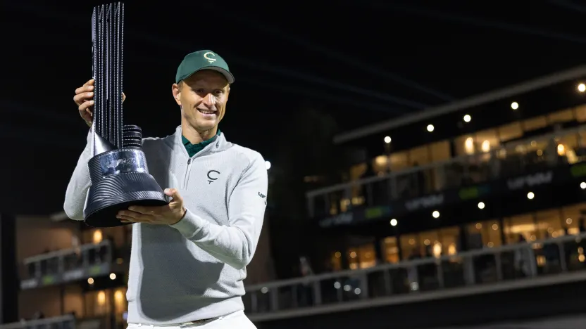 First place individual champion Adrian Meronk of Cleeks GC poses with the trophy on the 18th green after the final round of LIV Golf Riyadh at Riyadh Golf Club on Saturday, February 08, 2025 in Riyadh, Saudi Arabia. (Photo by Chris Trotman/LIV Golf)