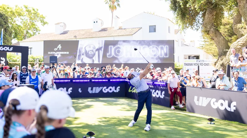 Captain Dustin Johnson of 4Aces GC hits his shot from the first tee during the final round of LIV Golf Andalucía at Real Club Valderrama on Sunday, July 13, 2025 in San Roque, Spain. (Photo by Chris Trotman/LIV Golf)