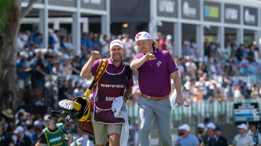 Captain Cameron Smith of Ripper GC and caddie, Sam Pinfold, on the 12th green during the first round of LIV Golf Adelaide at Grange Golf Club on Friday, February 14, 2025 in Adelaide, Australia. (Photo by Charles Laberge/LIV Golf)