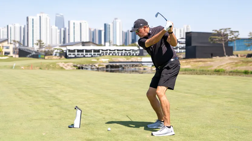 Captain Phil Mickelson of HyFlyers GC hits his shot from the 18th fairway during the practice round before the start of LIV Golf Korea at Jack Nicklaus Golf Club on Wednesday, April 30, 2025 in Incheon, South Korea. (Photo by Pedro Salado/LIV Golf)
