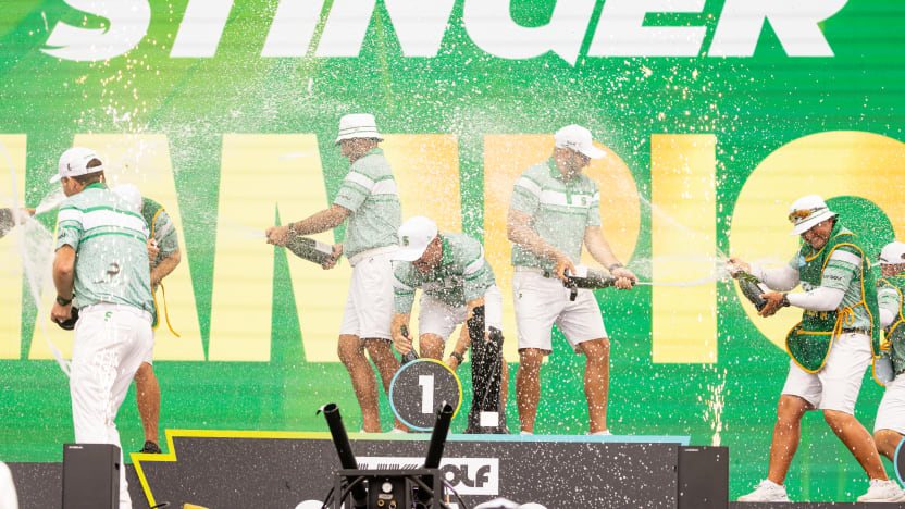 First place team champions, Charl Schwartzel, Dean Burmester, Louis Oosthuizen and Branden Grace of Stinger GC celebrate onstage following the final round of LIV Golf Chicago at Bolingbrook Golf Club on Sunday, August 10, 2025 in Bolingbrook, Illinois. (Photo by LIV Golf)