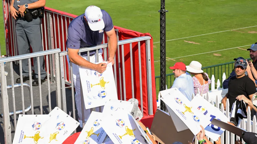 Bryson DeChambeau of Team USA signs autographs for fans during the practice round before the 2025 Ryder Cup at Bethpage State Park on Tuesday, September 23, 2025 in Farmingdale, New York. (Photo by Charles Laberge/LIV Golf)