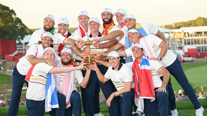Team Europe poses for a photo with the Ryder Cup Trophy after winning the 2025 Ryder Cup at Bethpage Black Golf Course on Sunday, September 28, 2025 in Farmingdale, New York. (Photo by Charles Laberge/LIV Golf)