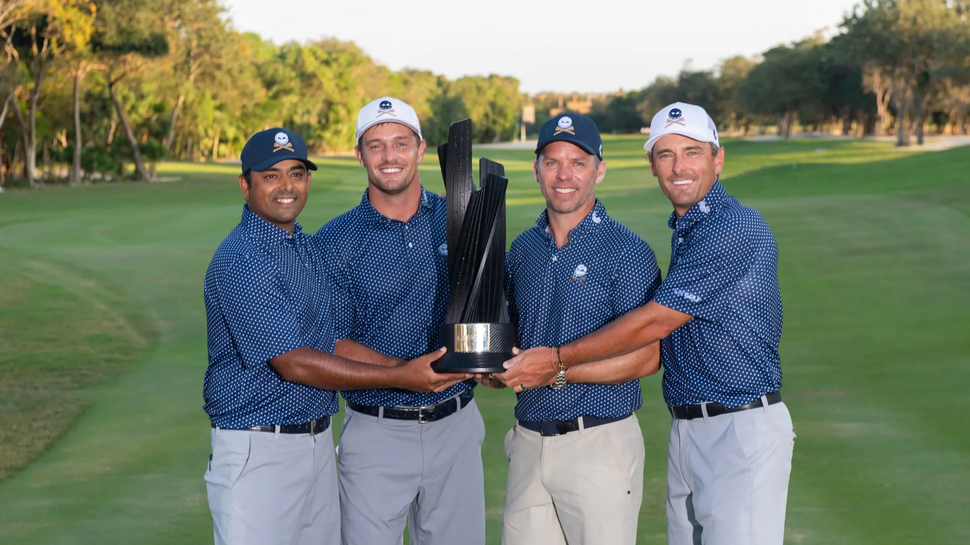 image: Crushers GC pose with their trophy after winning LIV Golf Mayakoba desktop image