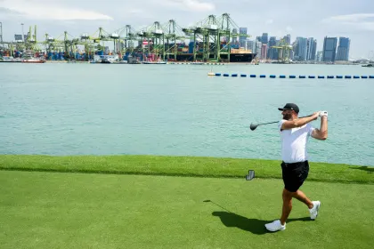 Captain Dustin Johnson of 4Aces GC hits his shot during the pro-am before the start of LIV Golf Singapore at Sentosa Golf Club on Thursday, March 13, 2025 in Sentosa, Singapore. (Photo by Charles Laberge/LIV Golf)